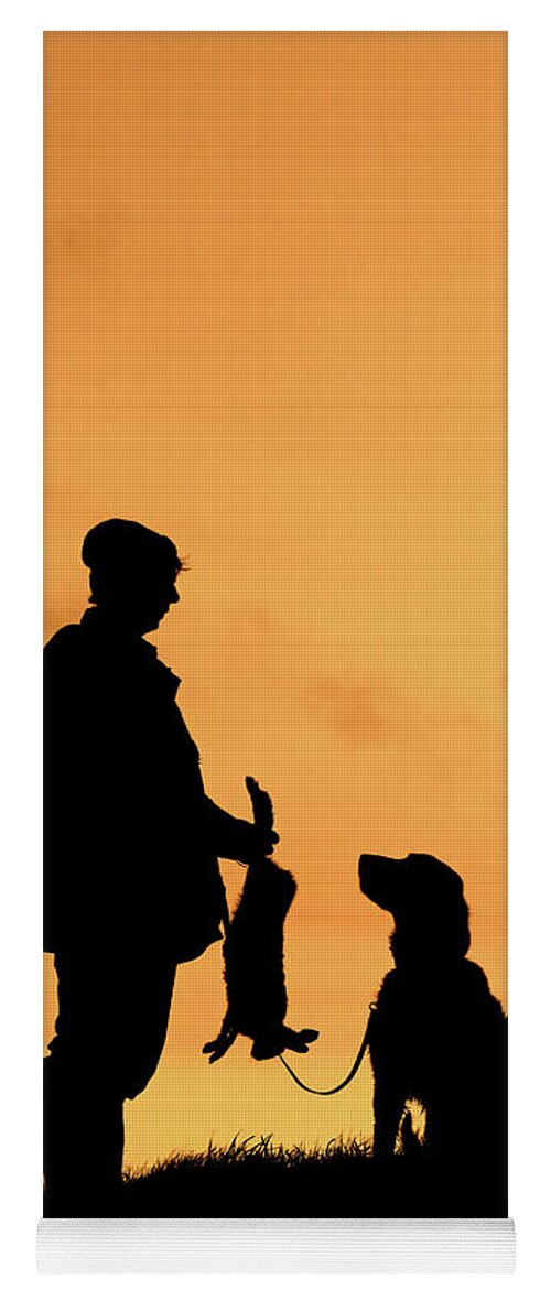 Hunter Yoga Mat featuring the photograph Hunter with Dog at Sunset by Arterra Picture Library