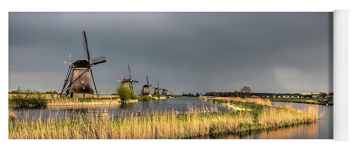 Windmill Yoga Mat featuring the photograph Kinderdijk Windmills After The Rain by Frans Blok