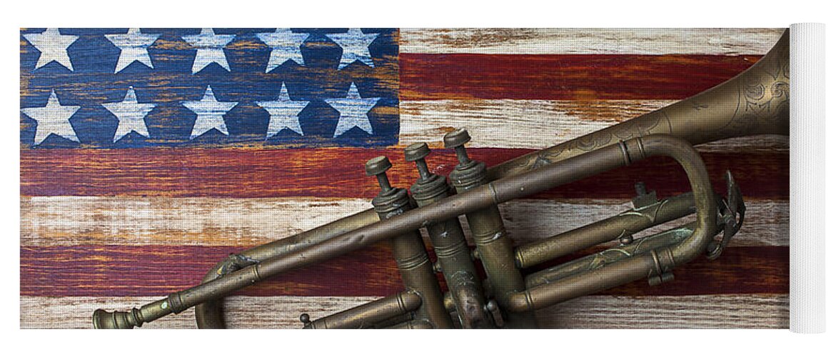Old Trumpet Yoga Mat featuring the photograph Old trumpet on American flag by Garry Gay