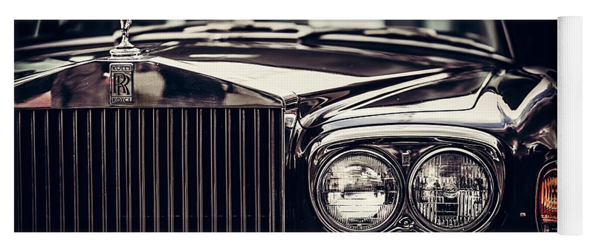 Car Yoga Mat featuring the photograph Rolls-Royce - classic British car on black background, close-up. by Michal Bednarek
