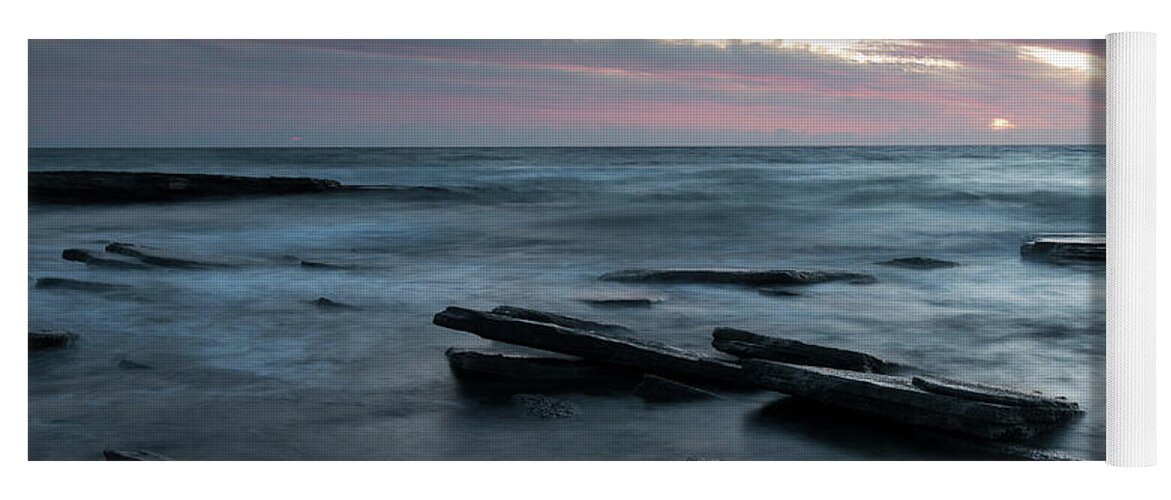 Seascape Yoga Mat featuring the photograph Sunset on a rocky beach by Michalakis Ppalis