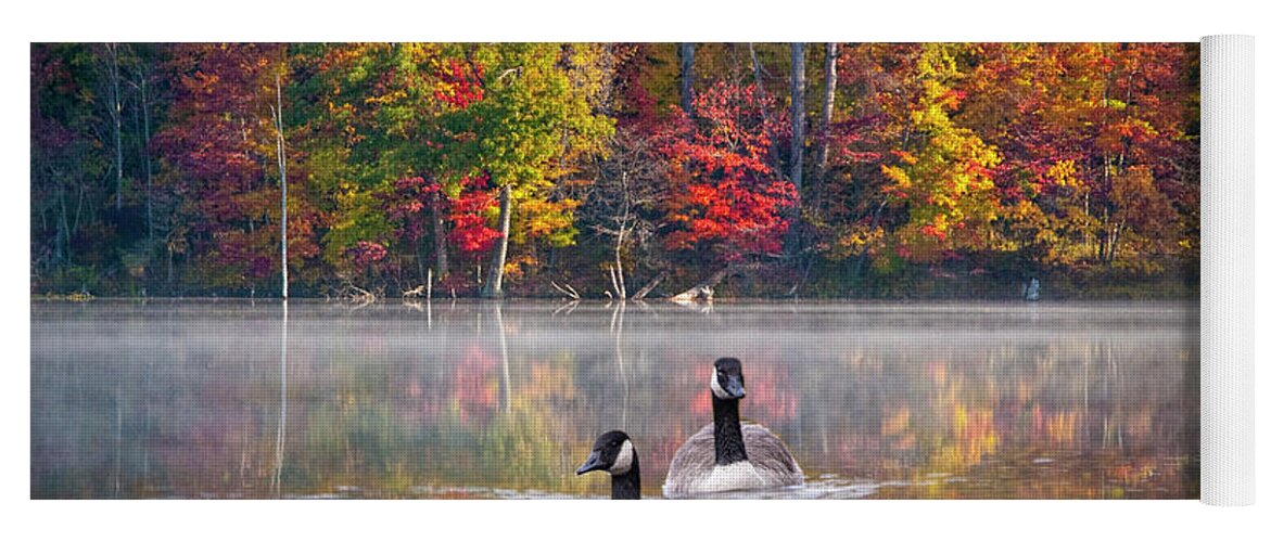 Canada Yoga Mat featuring the photograph Two Canadian Geese swimming in Autumn by Randall Nyhof