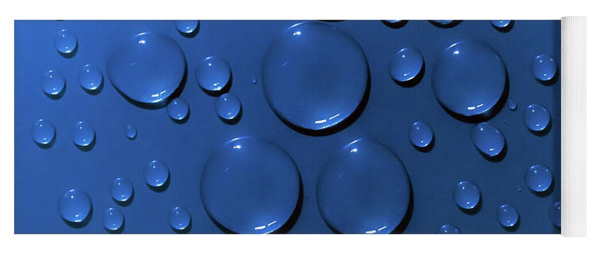 Water Yoga Mat featuring the photograph Water drops pattern on blue background by Simon Bratt