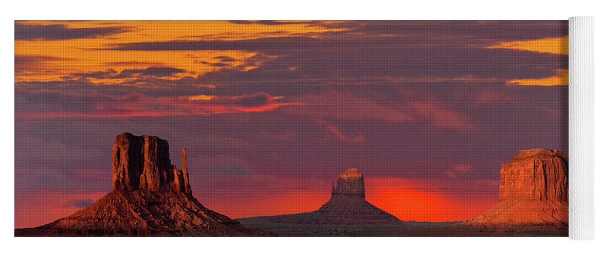 Arid Climate Yoga Mat featuring the photograph The Mittens and Merrick Butte at Sunset by Jeff Goulden