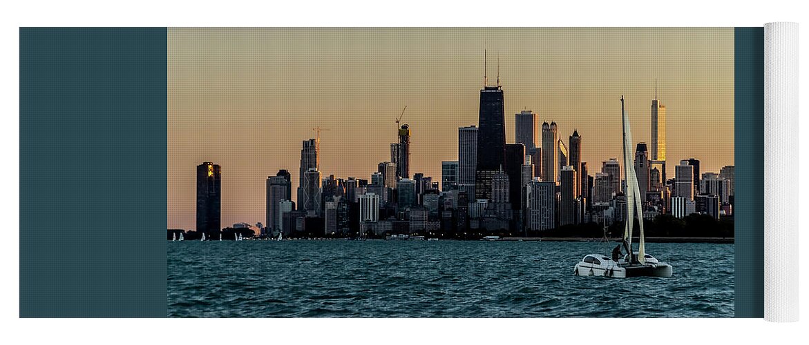Sunset Yoga Mat featuring the photograph A Catamaran at sunset in front of the Chicago Skyline by Sven Brogren
