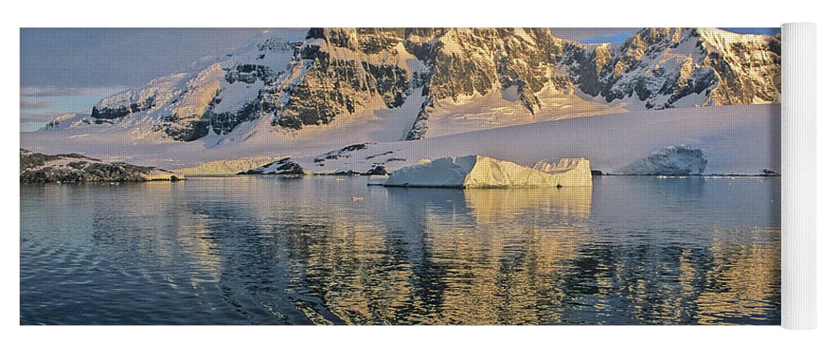 Estock Yoga Mat featuring the digital art Antarctic Peninsula, A Sun Rising On The Mountain Around Paradise Harbor by Livio Piatta