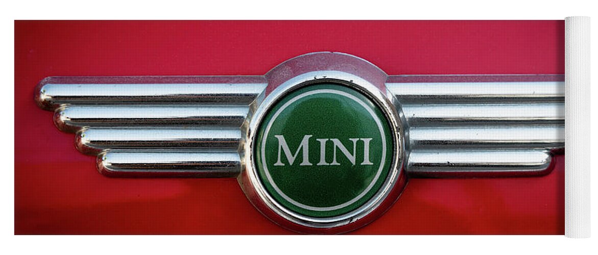 Mini Yoga Mat featuring the photograph Mini Cooper car logo on red surface by Michalakis Ppalis