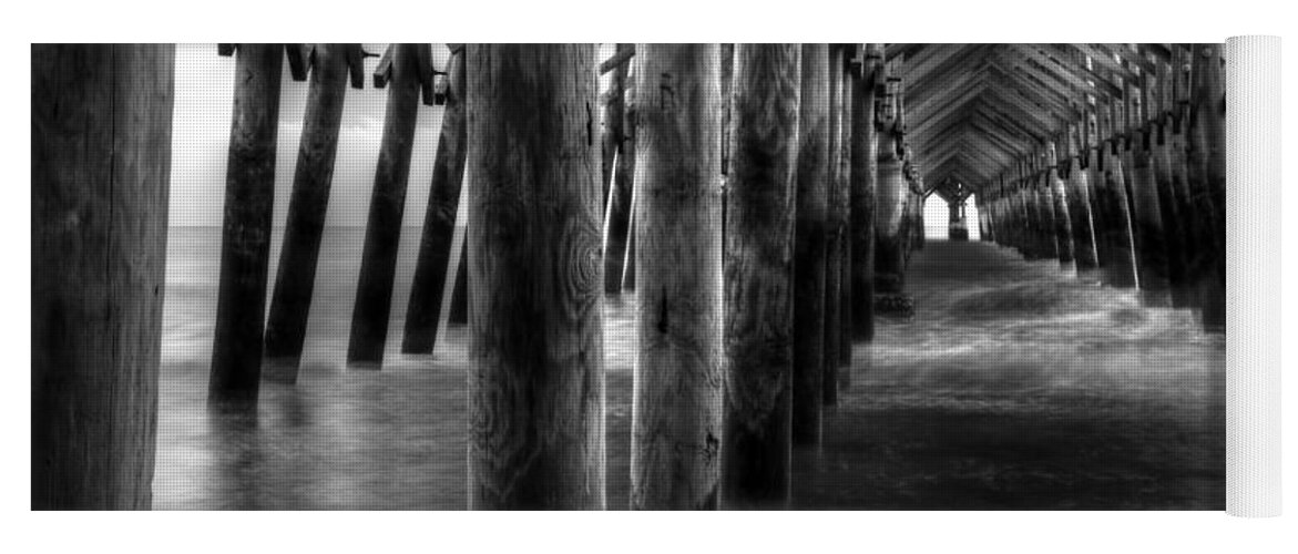 Pier Pilings Yoga Mat featuring the photograph Pier Pilings In Black And White by Carol Montoya