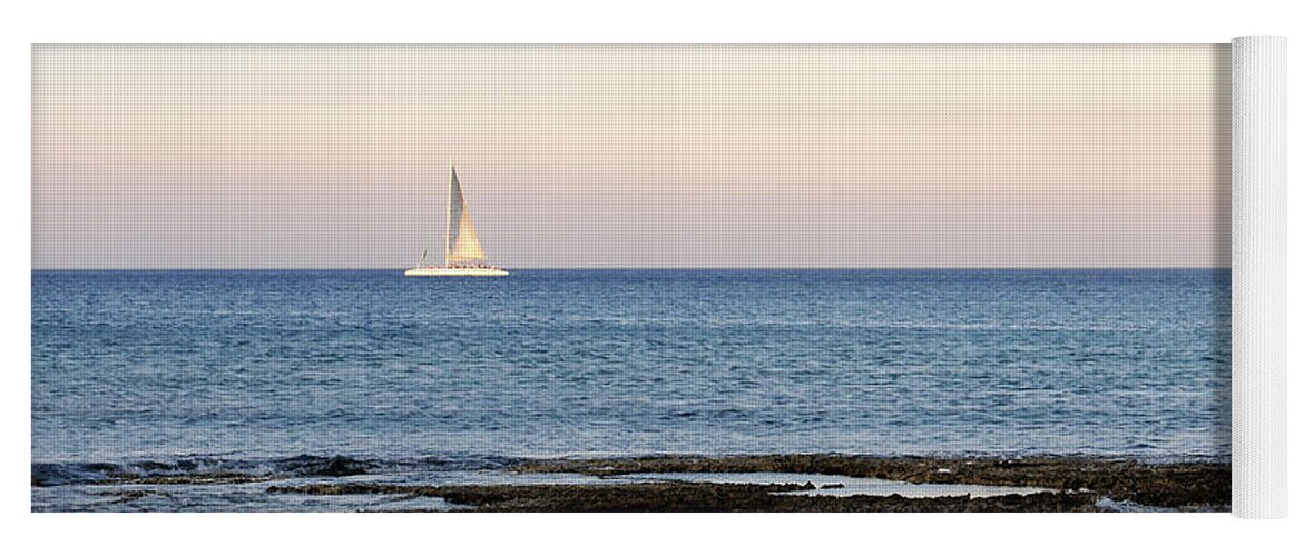 Sea Yoga Mat featuring the photograph Sailing boat in the Calm Ocean by Michalakis Ppalis