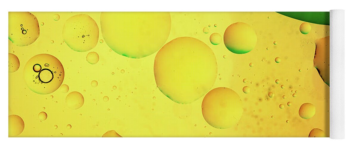 Fluid Yoga Mat featuring the photograph Abstract, image of oil, water and soap with colourful background by Michalakis Ppalis