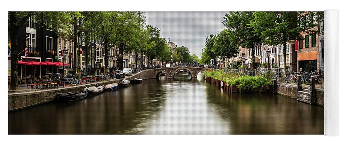 Canal Yoga Mat featuring the photograph Water canal in Amsterdam #3 by Fabiano Di Paolo