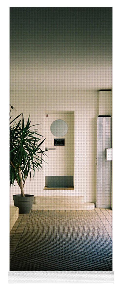 Hallway Yoga Mat featuring the photograph A clean hallway by Barthelemy De Mazenod