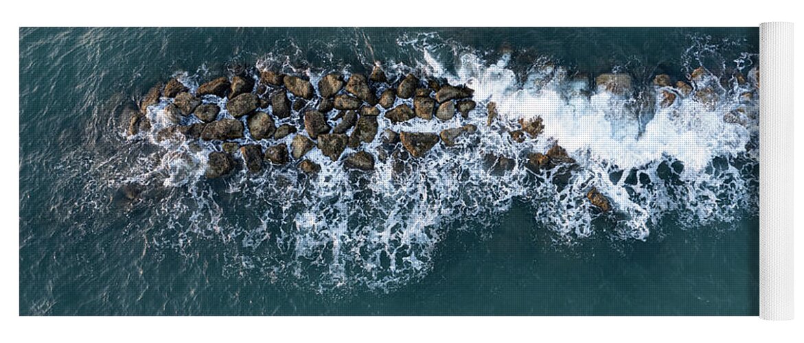 Ocean Yoga Mat featuring the photograph Aerial view from a flying drone of blue sea water and break water. Sea wall coastline by Michalakis Ppalis