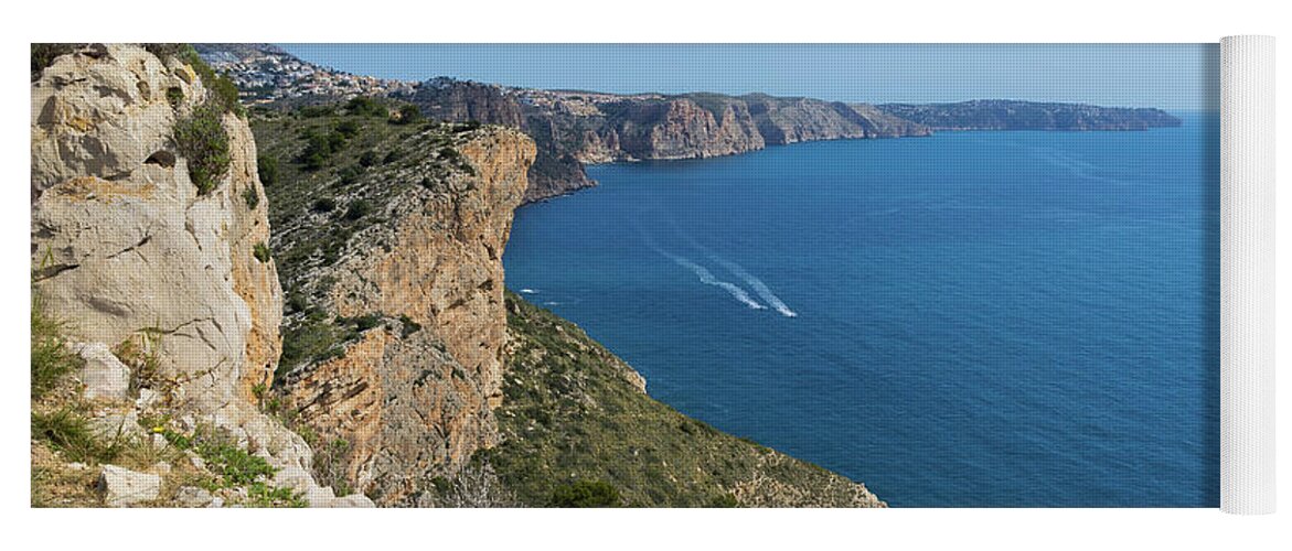 Mediterranean Sea Yoga Mat featuring the photograph Blue Mediterranean Sea and limestone cliffs by Adriana Mueller