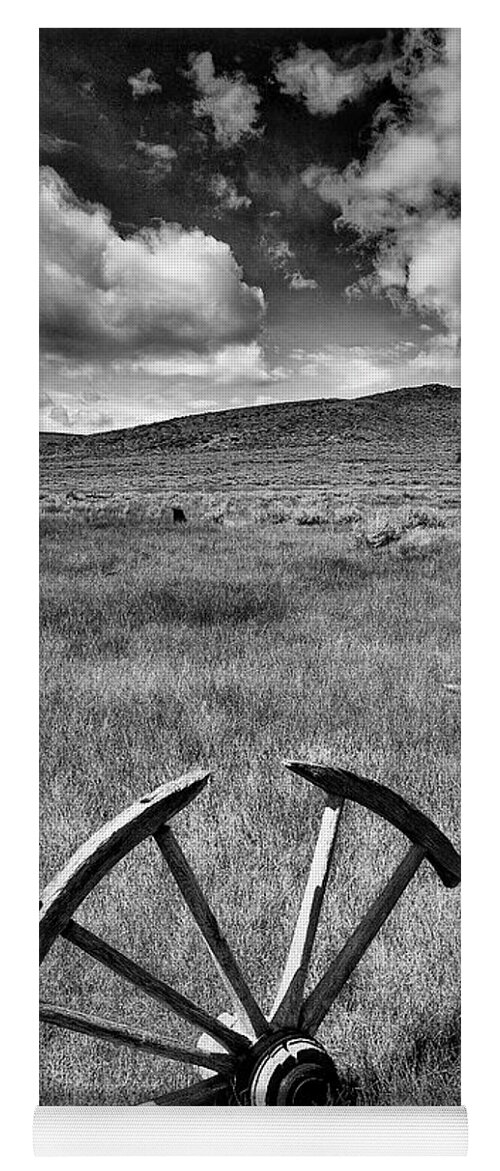 Bodie Yoga Mat featuring the photograph Bodie Ghost Town Wheel by Jon Glaser