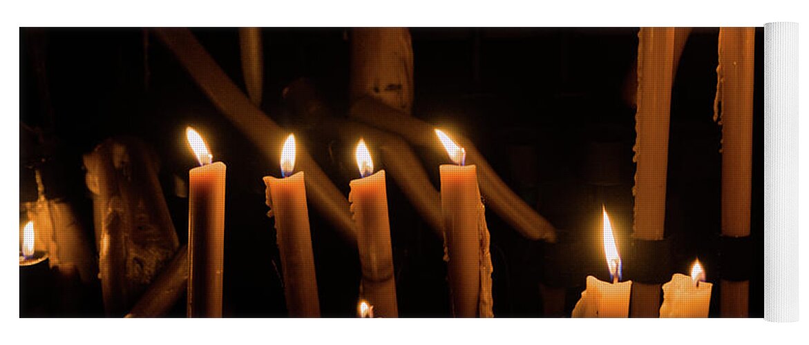 Candles Yoga Mat featuring the photograph Candles Burning at Night in Fatima Sanctuary by Angelo DeVal