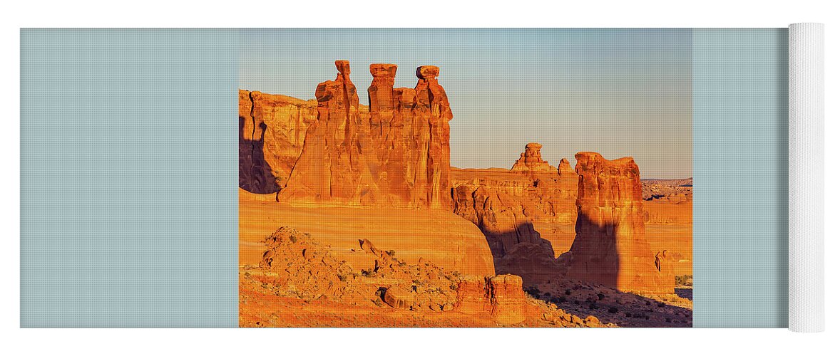 Landscape Yoga Mat featuring the photograph Early Morning Light on the Three Gossips by Marc Crumpler