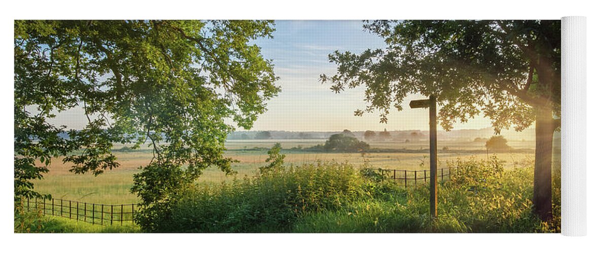 Norfolk Yoga Mat featuring the photograph Footpath sign in rural sunrise landscape Norfolk by Simon Bratt