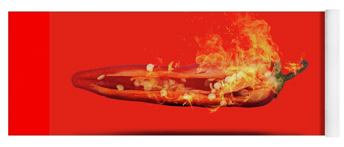 Red Yoga Mat featuring the photograph Half a red chili pepper on fire with seeds by Simon Bratt