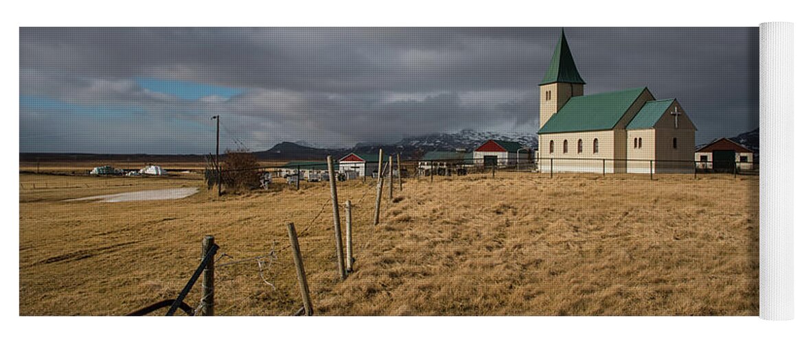 Icelandic Yoga Mat featuring the photograph Icelandinc landscape with traditional church in Iceland by Michalakis Ppalis