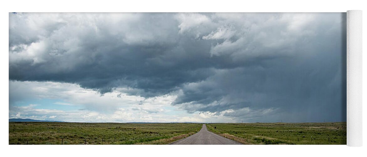 Storm Yoga Mat featuring the photograph Idaho Stormy Road by Wesley Aston