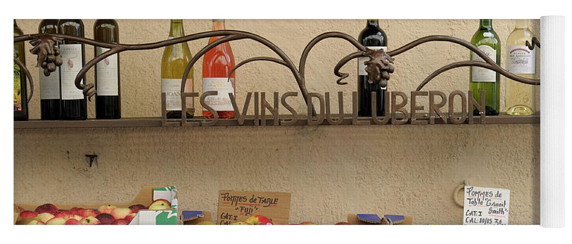 Market Yoga Mat featuring the photograph Les Vins Du Luberon store sign with wine bottles and fresh fruit, Lourmarin, France by Kevin Oke