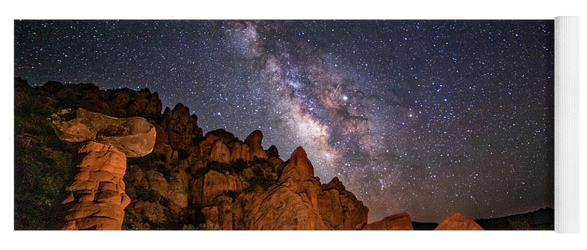 Milky Way Yoga Mat featuring the photograph Milky Way Over Rocky Terrain by Dan Norris