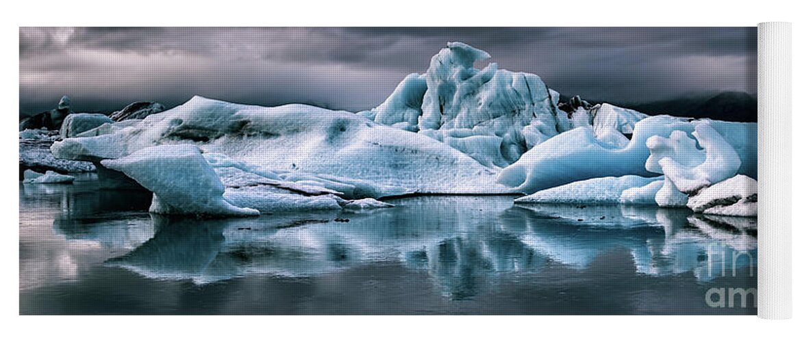 Lagoon Yoga Mat featuring the photograph Panorama of icebergs in the Jokulsarlon glacial lagoon, Vatnajokull National Park, Southern Iceland. Stormy sky and mirror reflection by Jane Rix