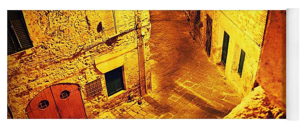 Golden Yoga Mat featuring the photograph Piazza by night in Tuscany by Ramona Matei