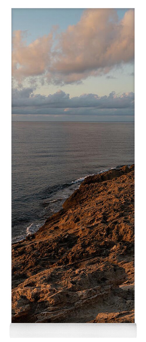 Mediterranean Sea Yoga Mat featuring the photograph Red-brown rocks and pink clouds on the Mediterranean Sea by Adriana Mueller