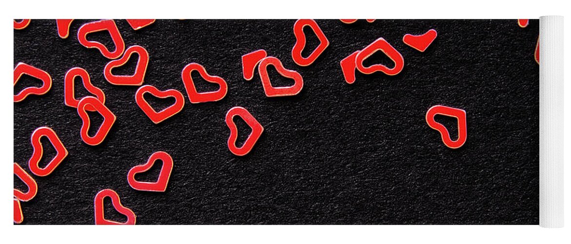 Confetti Yoga Mat featuring the photograph Red Heart Confetti On Black Background by Severija Kirilovaite