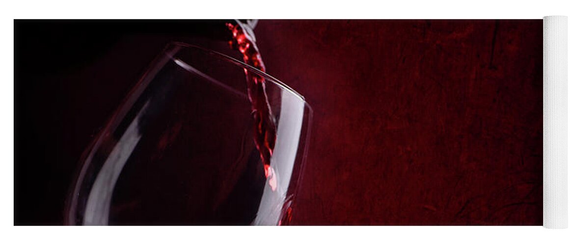 Wine Yoga Mat featuring the photograph Red wine pouring in wineglass by Jelena Jovanovic