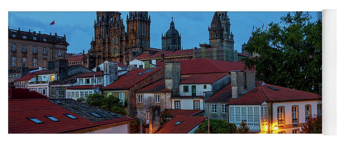 Way Yoga Mat featuring the photograph Santiago de Compostela Cathedral Spectacular View by Night Dusk with Street Lights and Tiled Roofs La Corua Galicia by Pablo Avanzini
