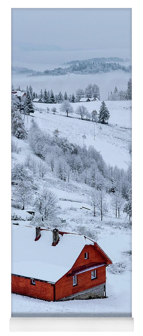 Landscape Yoga Mat featuring the photograph Snowy landscape with little red House by Jaroslaw Blaminsky