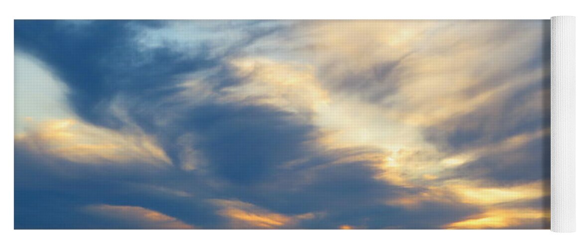 Sunset Yoga Mat featuring the photograph Swirling clouds at Sunset by Katie Keenan