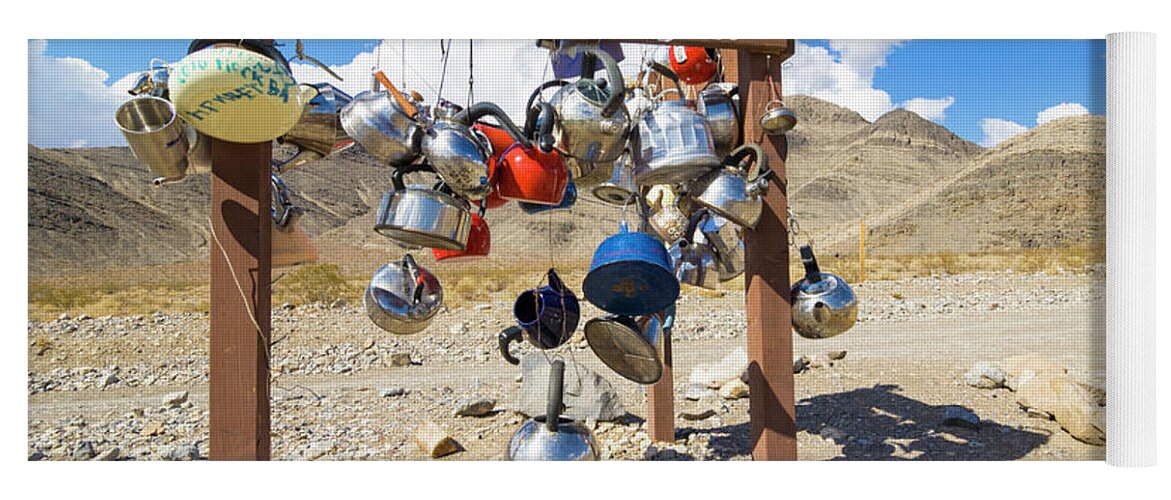 Road Yoga Mat featuring the photograph Teakettle Junction and road sign covered by kettles and pans, Death Valley National Park, California by Neale And Judith Clark