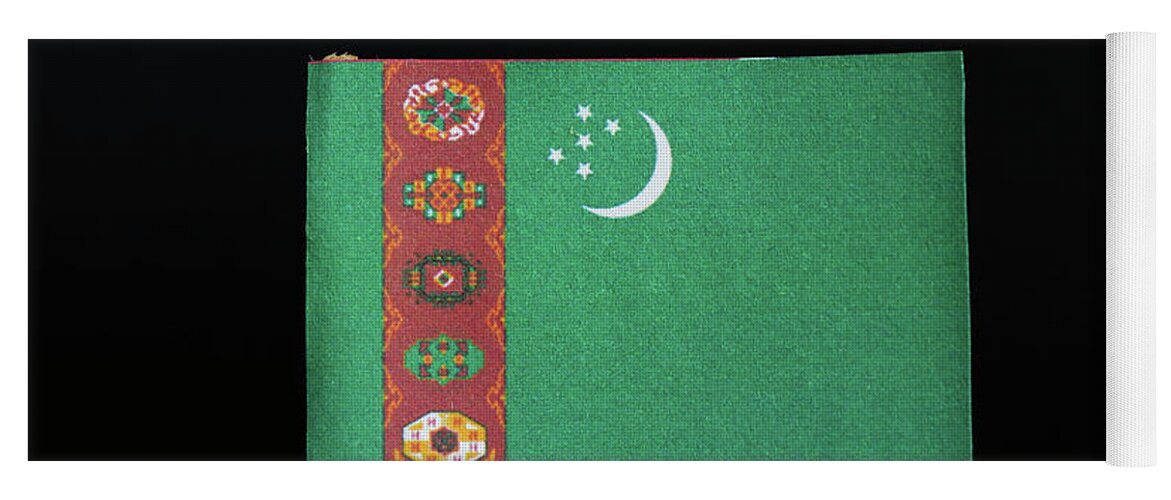 Poverty Yoga Mat featuring the photograph The national flag of Turkmenistan on toothpick on black background. A green field with a vertical red stripe near the hoist side by Vaclav Sonnek