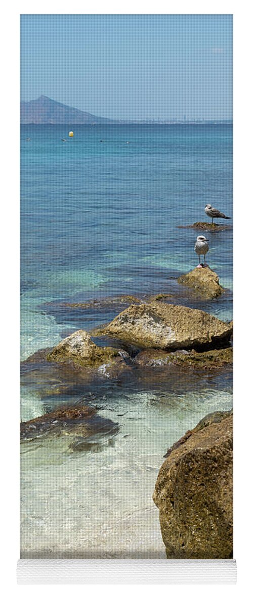 Mediterranean Yoga Mat featuring the photograph Turquoise blue sea water and rocks in Calpe 2 by Adriana Mueller