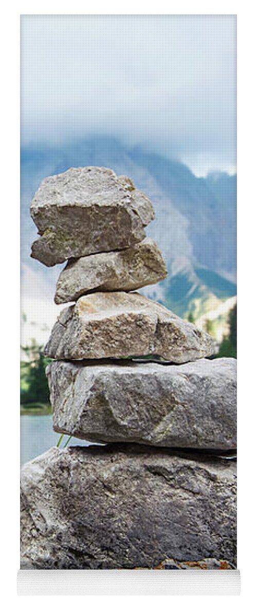 Two Yoga Mat featuring the photograph Two stone towers as route markers. by Bernhard Schaffer