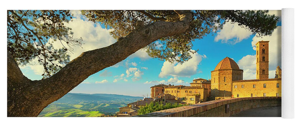 Volterra Yoga Mat featuring the photograph Volterra Skyline and a Tree by Stefano Orazzini