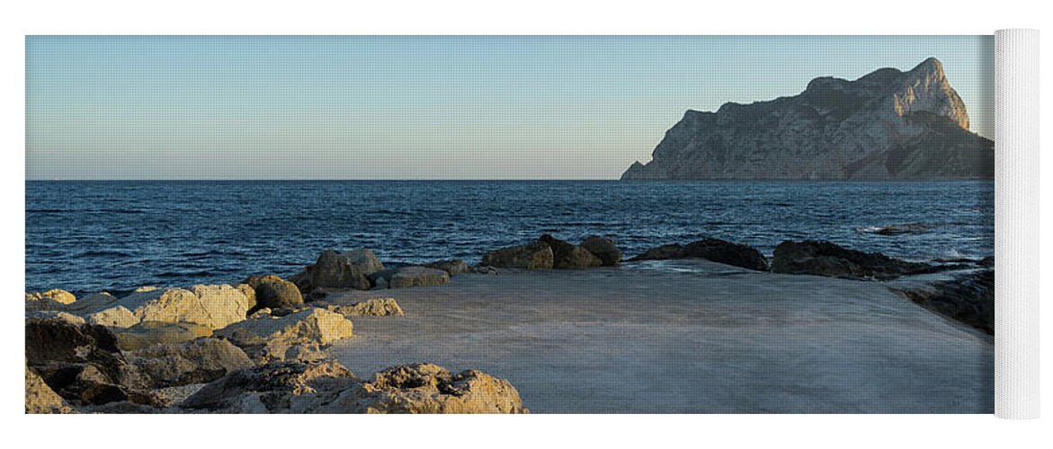 Mediterranean Coast Yoga Mat featuring the photograph Warm evening light meets deep blue by Adriana Mueller