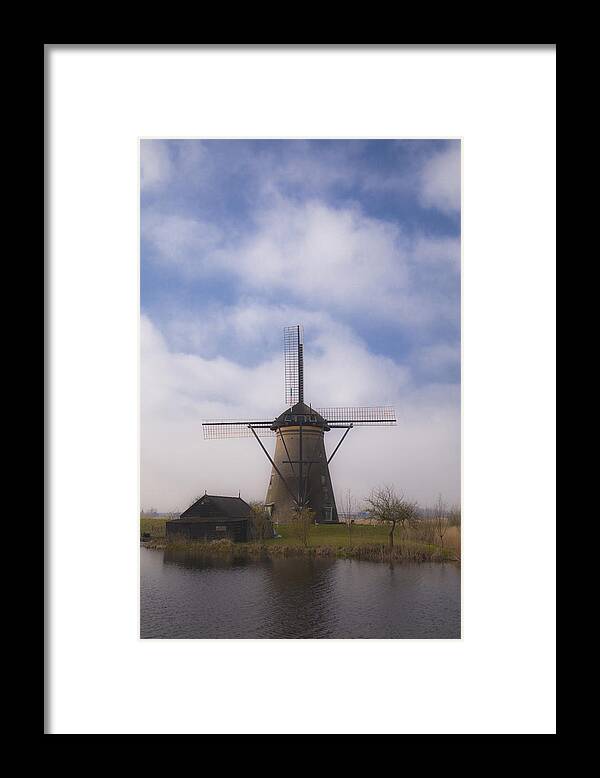Water Framed Print featuring the photograph Windmill in Kinderdijk Netherlands by Maria Heyens