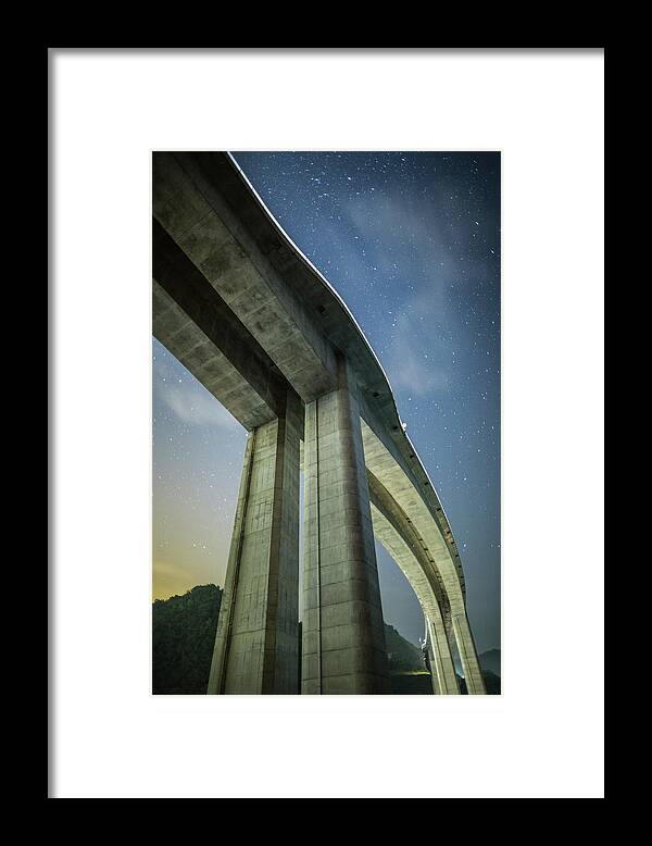Tranquility Framed Print featuring the photograph A Highway Bridge At Night #1 by Trevor Williams