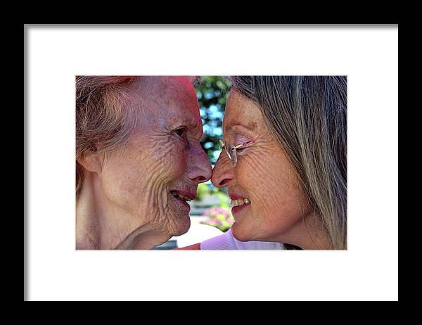 Alzheimer's Disease Framed Print featuring the photograph Alzheimer's Patient With Her Daughter #1 by Tony Craddock/science Photo Library