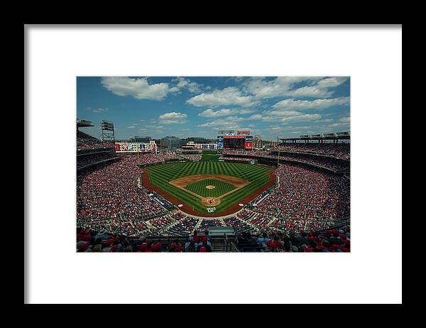 Motion Framed Print featuring the photograph Atlanta Braves V. Washington Nationals #1 by Rob Tringali