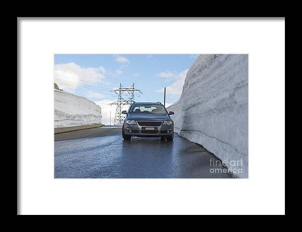 Car Framed Print featuring the photograph Car and snow wall #1 by Mats Silvan