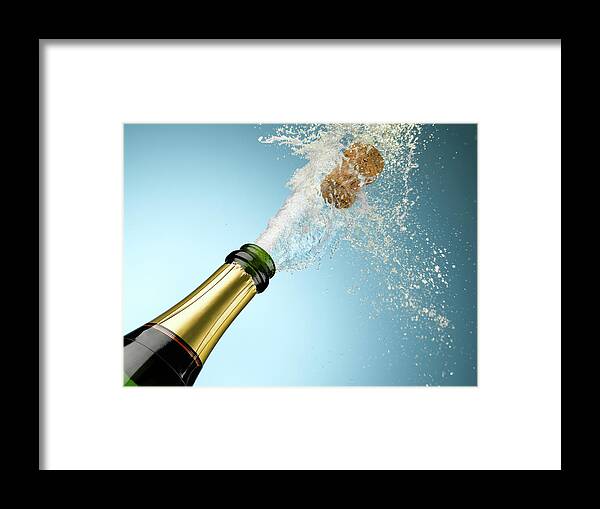 Celebration Framed Print featuring the photograph Champagne And Cork Exploding From Bottle #1 by Andy Roberts
