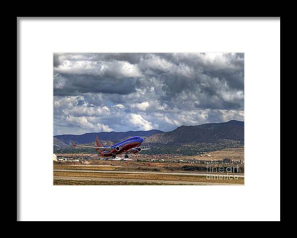 Cleared For Departure Framed Print featuring the photograph Cleared For Departure #1 by Eddie Yerkish