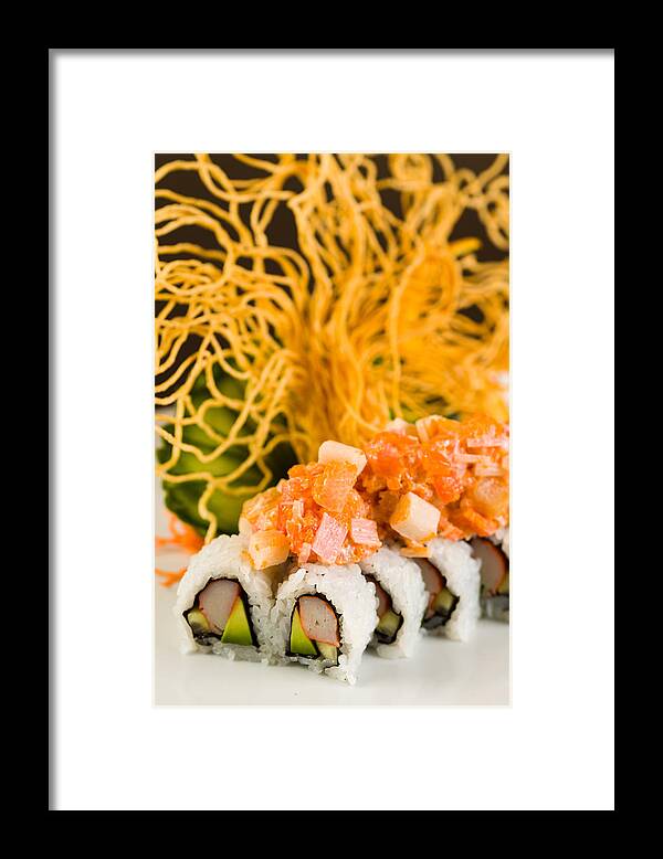 Asian Framed Print featuring the photograph Crab and Salmon Roll by Raul Rodriguez