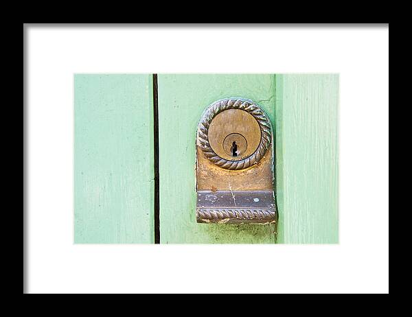 Aluminum Framed Print featuring the photograph Door lock #1 by Tom Gowanlock